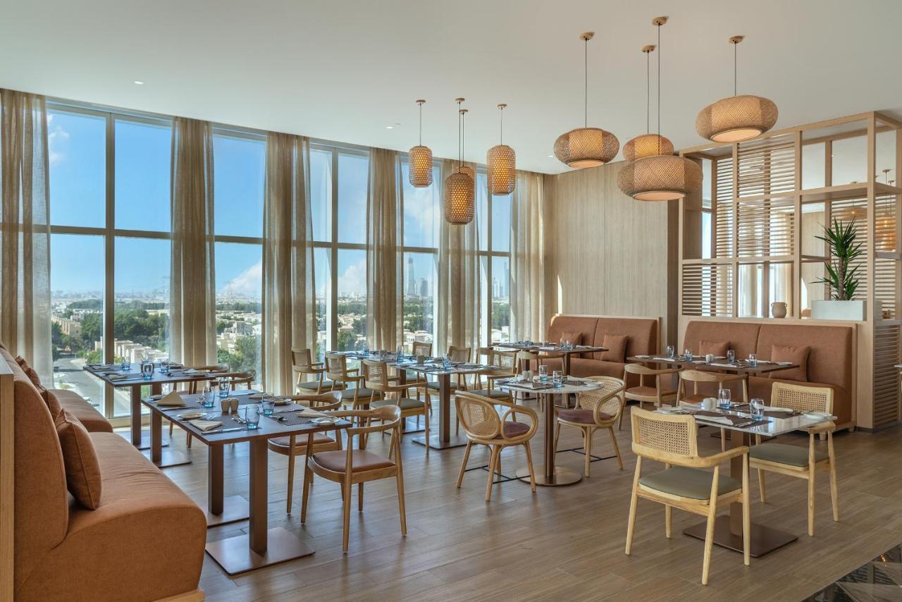 Novotel Jumeirah Village Triangle Dubai Exteriör bild